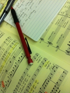 A singer's best tools: score, pencil, cue cards, and memory.